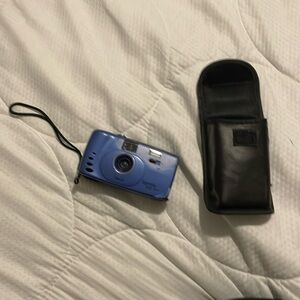 Brand:Suprema mini GTG,28 mm lens with case, light easy to carry, nice pic.